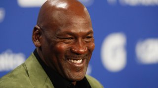 Former basketball superstar Michael Jordan speaks during a press conference ahead of NBA basketball game between Charlotte Hornets and Milwaukee Bucks in Paris, Friday, Jan. 24, 2020.