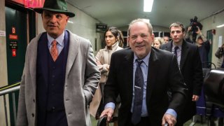 Harvey Weinstein, center, leave Manhattan’s Criminal Court with his lawyer Arthur Aidala, far left, where he’s on trial for rape and sexual assault, Wednesday Jan. 29, 2020, in New York.