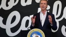 Gov. Gavin Newsom discusses his plan for the gradual reopening of California businesses during a news conference at the Display California store in Sacramento, Calif., Tuesday, May 5, 2020.