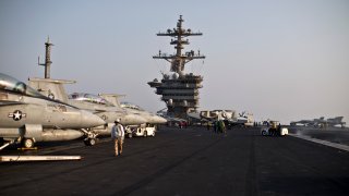 This photo shows a general view of the USS Theodore Roosevelt flight deck, Thursday, Sept. 10, 2015.