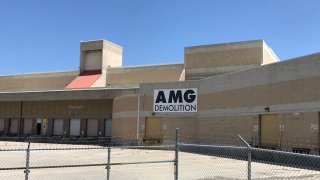 AMG Demolition sign at the old Midway Post Office