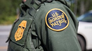 In this Aug. 1, 2018, file photo, a patch on the uniform of a U.S. Border Patrol agent at a highway checkpoint in West Enfield, Maine.