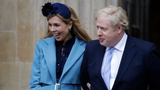 In this Monday, March 9, 2020, file photo, Britain's Prime Minister Boris Johnson and his partner Carrie Symonds arrive to attend the annual Commonwealth Day service at Westminster Abbey in London.