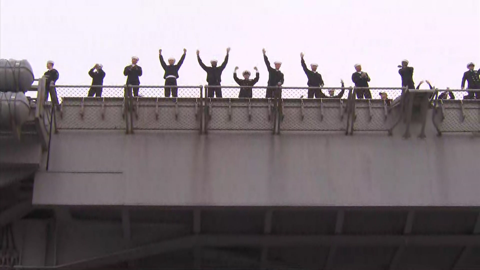 San Diegans await the return of their loved ones return from a 10-month &#8220;around the world&#8221; deployment. Family members held &#8220;welcome home signs&#8221; as upbeat music played in the background while USS Lincoln cruised into its new homeport of San Diego.