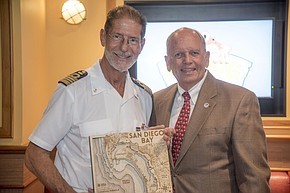Garry Bonelli, chairman of the Board of Port Commissioners in San Diego, and the captain of the Carnival Miracle cruiseliner