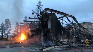 The burnt remanence of the Chase bank on Spring Street in La Mesa after it was set on fire.