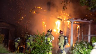 San Diego police tweeted this image of the flames tearing through the home in City Heights Sunday night.