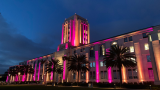 The San Diego County Administration building illuminated in honor of George Floyd.