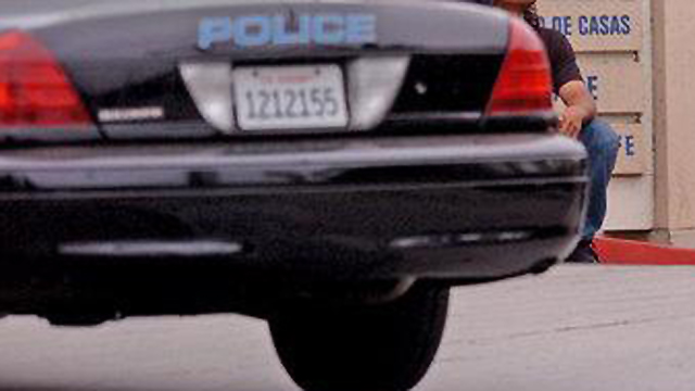 Man killed after vehicle hits tree, rolls into back yard in Escondido