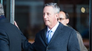 BOSTON, MA - MARCH 25: Martin Fox, president of a private tennis academy in Houston, leaves following his arraignment at Boston Federal Court on March 25, 2019 in Boston, Massachusetts. A dozen coaches, athletic directors and test proctors are being arraigned in relation to the college admissions scandal on Monday.