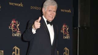 In this May 5, 2019, photo, “Jeopardy!” host and winner of the Outstanding Game Show Host award Alex Trebek poses at the 46th Annual Daytime Emmy Awards at Pasadena Civic Center in Pasadena, California.