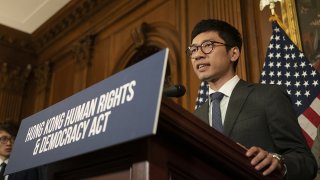 In this Sept. 19, 2019, file photo, Nathan Law, founding chairman and standing committee member of the Demosisto political party, speaks during a news conference about the Hong Kong Human Rights and Democracy Act on Capitol Hill in Washington, D.C..jpg