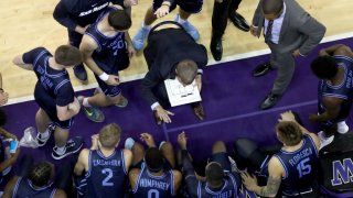 SEATTLE, WASHINGTON – NOVEMBER 24: Head Coach Sam Scholl of the San Diego Toreros discusses play with his team in the second half against the Washington Huskies during their game at Hec Edmundson Pavilion on November 24, 2019 in Seattle, Washington. (Photo by Abbie Parr/Getty Images)
