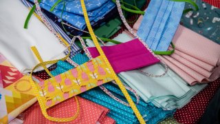 Self-sewn protective face masks in a fabric store on April 3, 2020, in Jena, Germany. With a severe shortage of surgical masks in the market, some have taken to making their own at home.