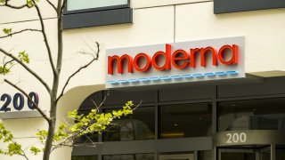 Signage is displayed on the Moderna Inc. headquarters in Cambridge, Massachusetts, U.S., on Monday, May 25, 2020.