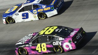 BRISTOL, TENNESSEE – MAY 31: Chase Elliott, driver of the #9 NAPA Auto Parts Chevrolet, leads Jimmie Johnson, driver of the #48 Ally Chevrolet, during the NASCAR Cup Series Food City presents the Supermarket Heroes 500 at Bristol Motor Speedway on May 31, 2020 in Bristol, Tennessee. (Photo by Jared C. Tilton/Getty Images)