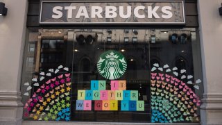The view of a Starbucks coffee shop displaying pride colors on June 21, 2020 in New York City