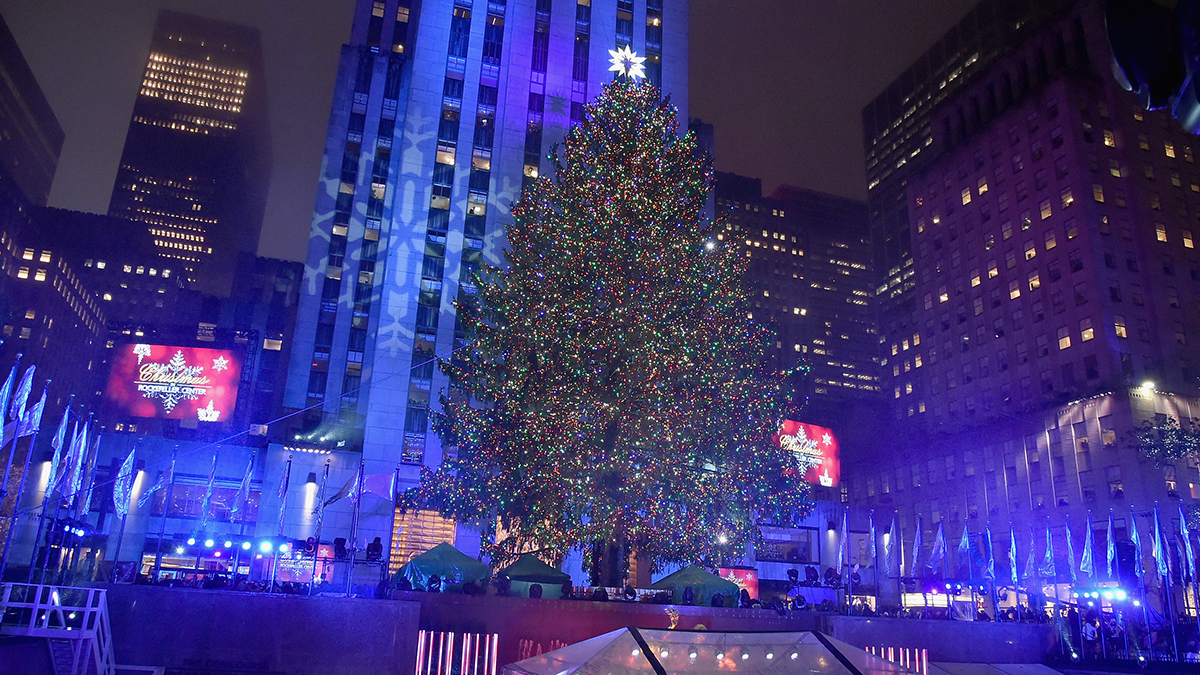 The 84th Rockefeller Center Christmas Tree lights up for the holiday season at Rockefeller Center on Nov. 30, 2016, in New York City.  