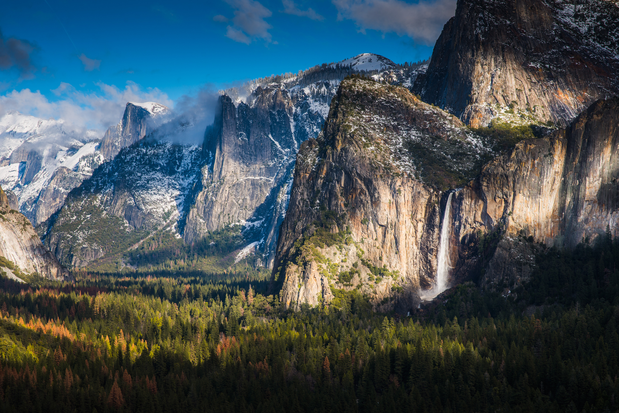 Tunnel View is a scenic overlook on State Route 41 in Yosemite National Park. The iconic and expansive view of Yosemite Valley from the view point have been seen and documented by visitors since it opened in 1933. Photo: Beihua Steven Guo