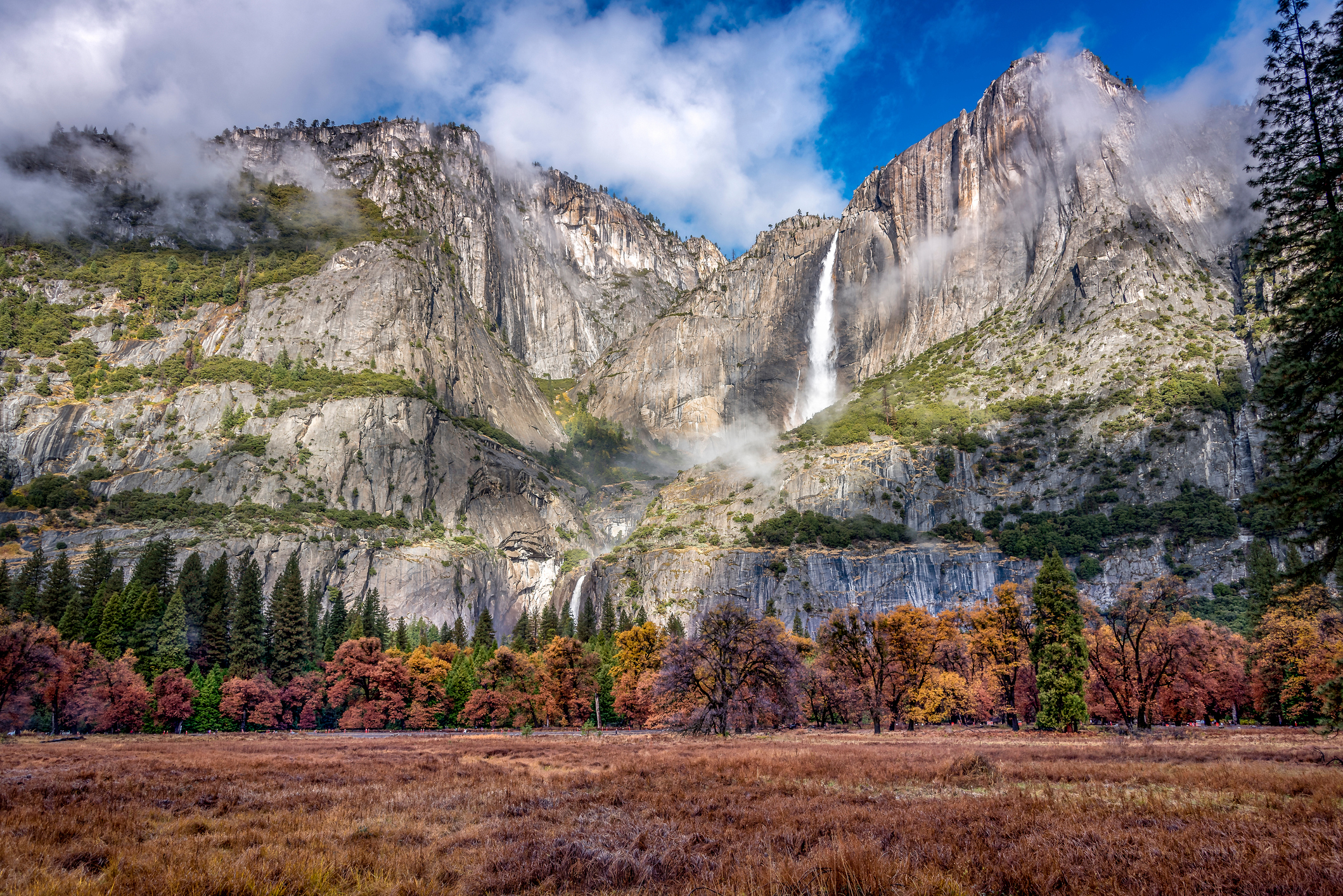 Colorful trees and a powerful waterfall form an iconic valley sight. Photo: Chavalit Likitracharoen/EyeEm