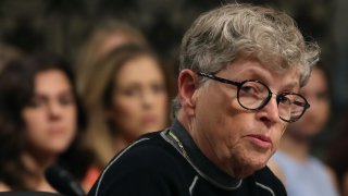 Lou Anna Simon, former president of Michigan State University, testifies during a Senate Commerce, Science and Transportation Committee hearing, on June 5, 2018 in Washington, DC.