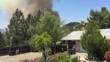 Skyline Fire behind homes