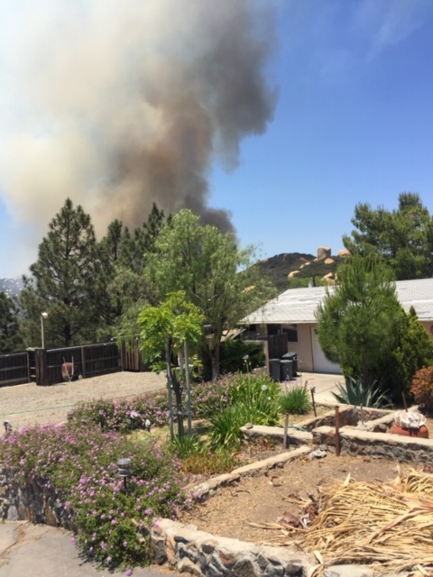 Skyline Fire behind homes