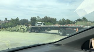 The mess left behind by an overturned semi truck on I-15.