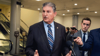 Sen. Joe Manchin, D-W.Va., speaks to reporters on Capitol Hill in Washington, Saturday, Jan. 25, 2020, as work resumes in the impeachment trial of President Donald Trump on charges of abuse of power and obstruction of Congress.