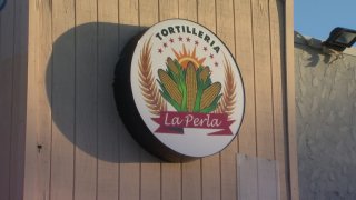 logo of tortilla store in logan heights