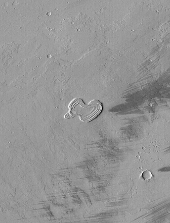 "This picture of a landform that somewhat resembles a Valentine’s Day heart was acquired nearly two months ago by the CTX on 23 December 2007. The heart is about 1 kilometer (0.62 miles) across." Released in 2008.