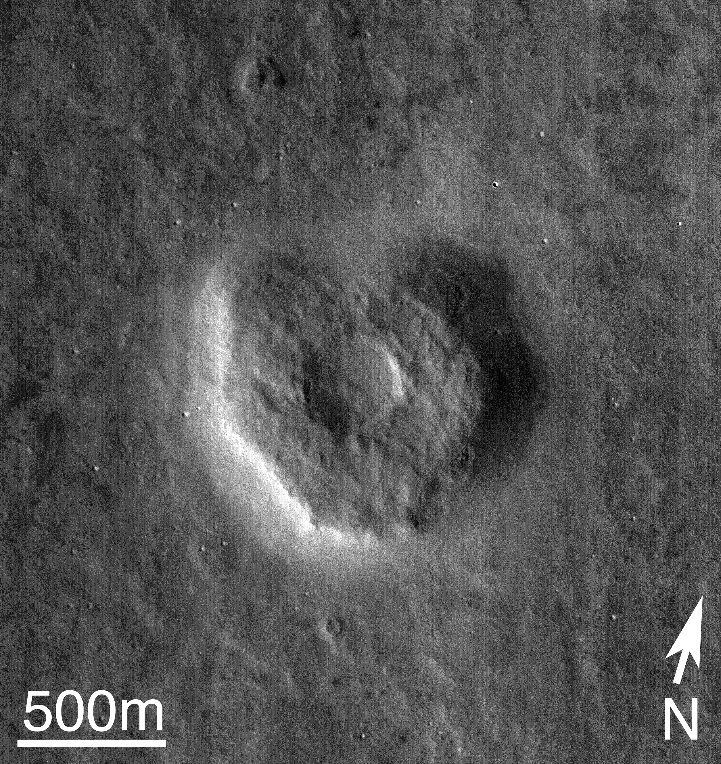 "This image of a heart-shaped mesa with a crater at the center was taken by the CTX camera on the MRO spacecraft this week, on February 7, 2016. The mesa is located at 56.7°N, 111.4°W in the northern plains, where the atmospheric clarity is still a bit hazy."  Released in 2016.