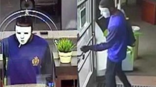 Masked Suspect in Bank Robbery