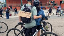 couple of bikers with signs