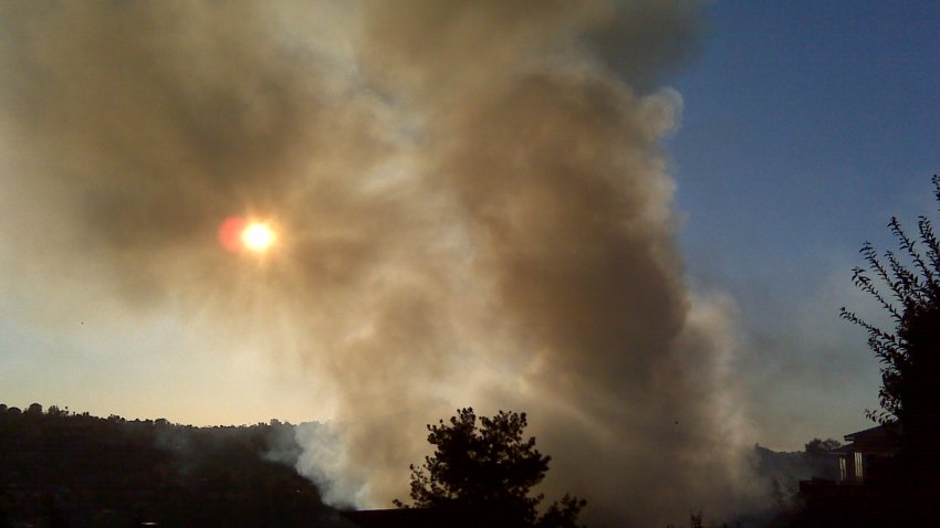 Smoke filled the area above the canyon, putting homeowners on watch.