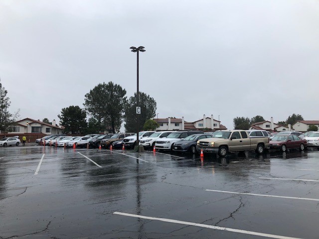 Families Wait Hours in Downpour for Donations From SD Food Bank in