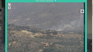 Smoke from a brush fire is visible from the Mt. Woodsoon SDG&E camera on Sunday, July 5, 2020.