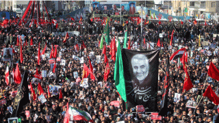 In this Jan. 7, 2020, file photo, mourners attend a funeral ceremony for Iranian Gen. Qassem Soleimani and his comrades, who were killed in Iraq in a U.S. drone strike on Friday, in the city of Kerman, Iran.