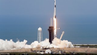 A SpaceX Falcon 9, with NASA astronauts Doug Hurley and Bob Behnken in the Dragon crew capsule, lifts off from Pad 39-A at the Kennedy Space Center in Cape Canaveral, Fla., Saturday, May 30, 2020. The two astronauts are on the SpaceX test flight to the International Space Station. For the first time in nearly a decade, astronauts blasted towards orbit aboard an American rocket from American soil, a first for a private company.