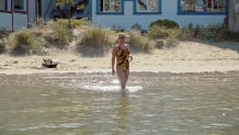 Swimmer wading in water