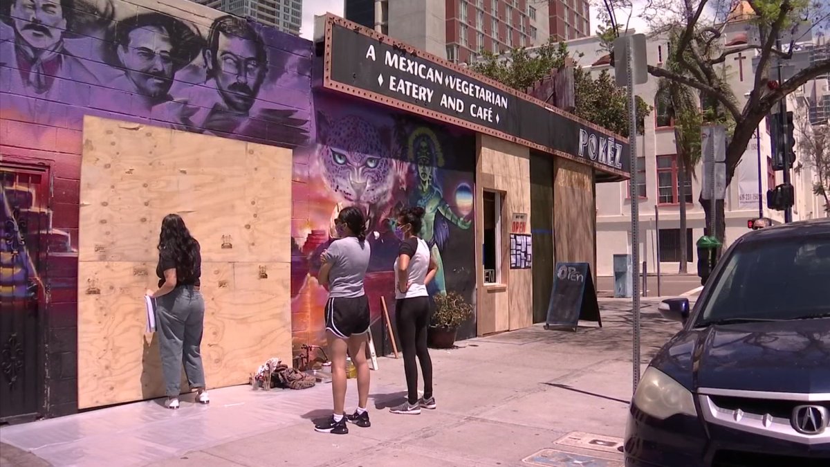 Artists Paint Murals on Boarded Up Businesses as Part of ‘Paint the