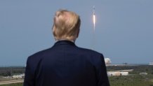 President Donald Trump views the SpaceX flight to the International Space Station, at Kennedy Space Center, Saturday, May 30, 2020, in Cape Canaveral, Fla.