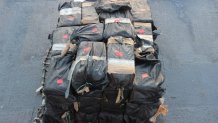 Bales of cocaine are shown aboard the Coast Guard Cutter Active (WMEC-618).