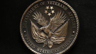 The seal of the Department of Veterans Affairs is seen on the building in Washington, Friday, June 21, 2013. (AP Photo/Charles Dharapak)