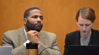 Defendant Willie Cory Godbolt, seated left of one of his attorneys, Katherine Poor, listens to his 12-year-old daughter’s testimony on the third day of Godbolt’s capital murder trial at the Pike County Courthouse in Magnolia, Miss. Godbolt, 37, is on trial, for the May 2017 shooting deaths of eight people in Brookhaven.