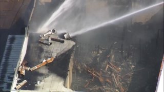 Fire tears through warehouse