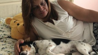 María Burgos finds comfort in her dogs. She says being with them helps her canalize all the stress.