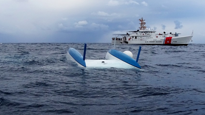 capsized catamaran