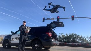 A Chula Vista Police Department officer with one of the department's drones in an undated image.