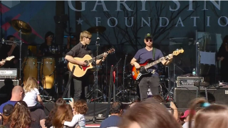 Actor Gary Sinise performing with the Lt. Dan Band